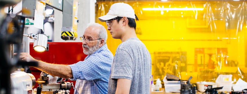 Professor and student in lab