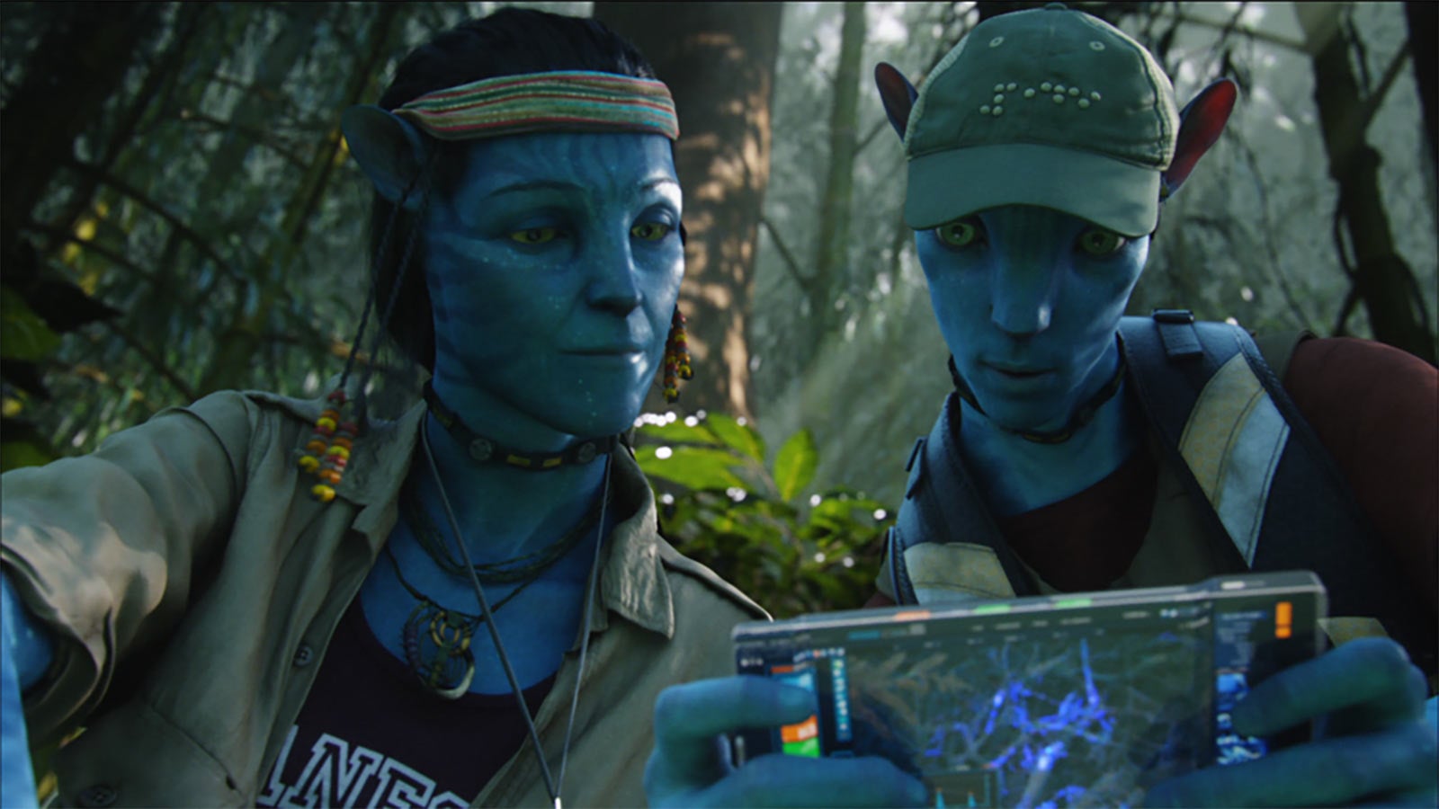 Two alien scientists are examining plant life.