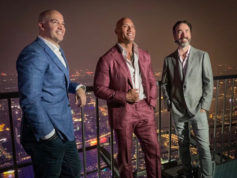 Chris Morgan at an after party event with Dwayne Johnson. Chris Morgan at an after party event with Dwayne Johnson.