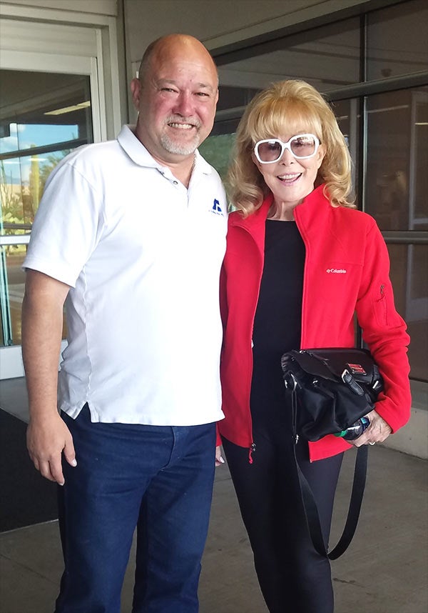 Mallett with “I Dream of Jeannie” actress Barbara Eden.