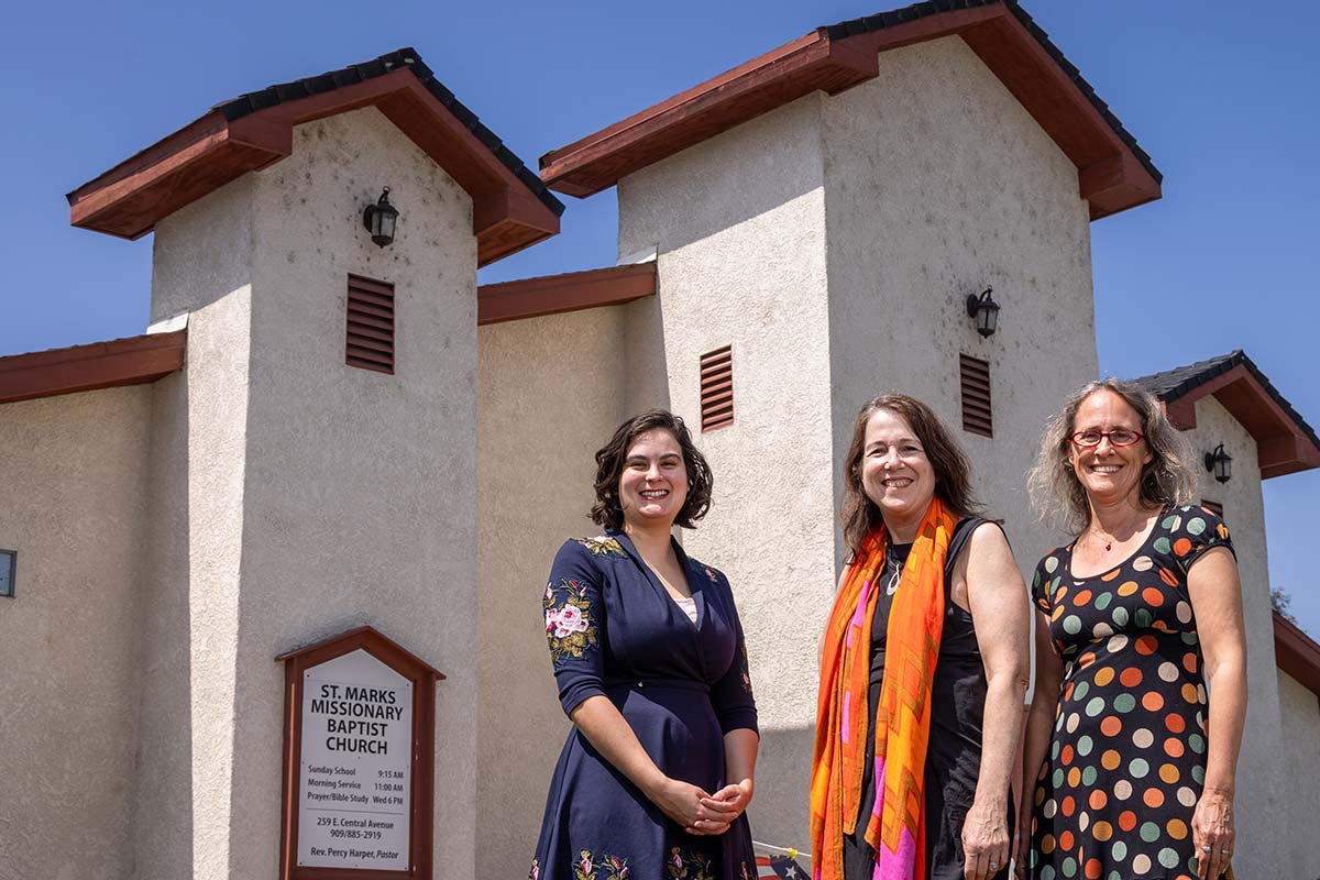 aHistorians from left, Audrey Maier, Cathrine Gudis, and Jennifer Tilton, outside St. Mark’s Missionary Baptist Church.
