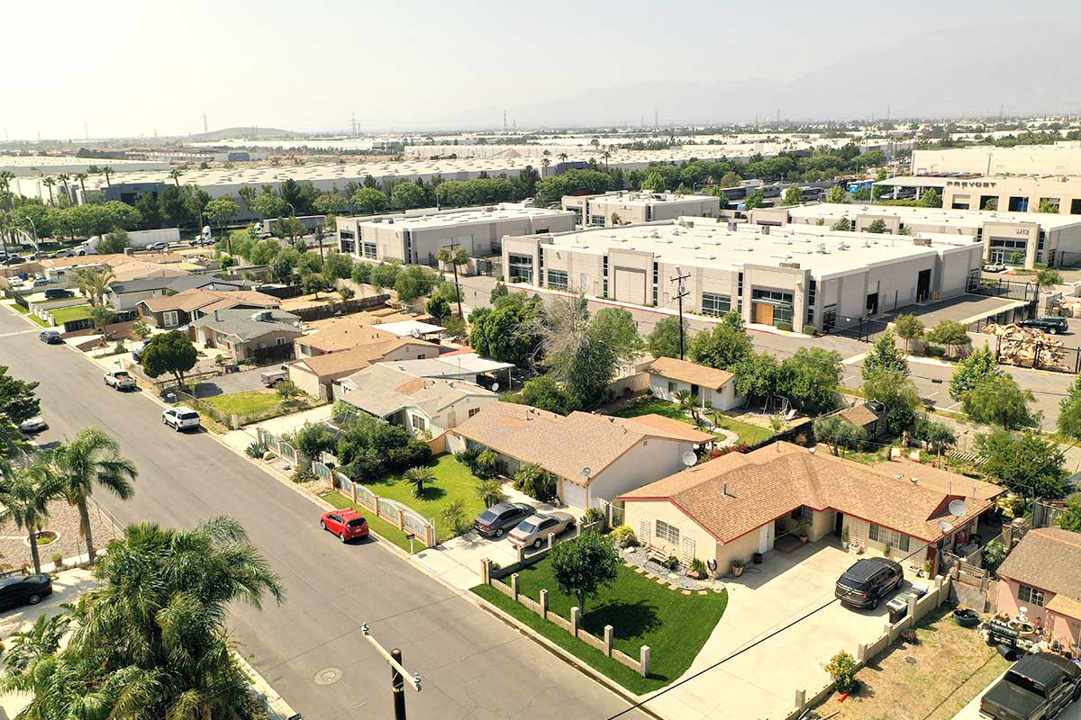 The 101 homes in Mira Loma Village are surrounded on all sides by warehouses.