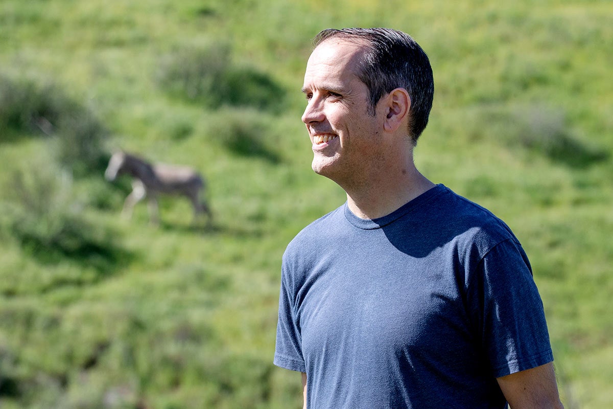 Portrait of researcher Marko J. Spasojevic, Associate Professor in the Dept. of EEOB, in the Box Springs Mountain Reserve.