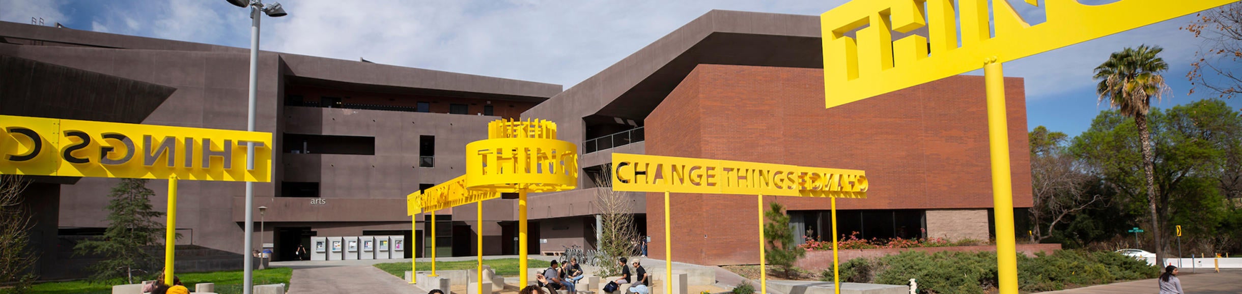students dancing in front of Arts building