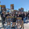 Amazon delivery drivers demonstrating in response to the company retaliating against workers’ efforts to unionize.