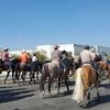 Bloomington community members participating in a cabalgata as a form of protest against developers.