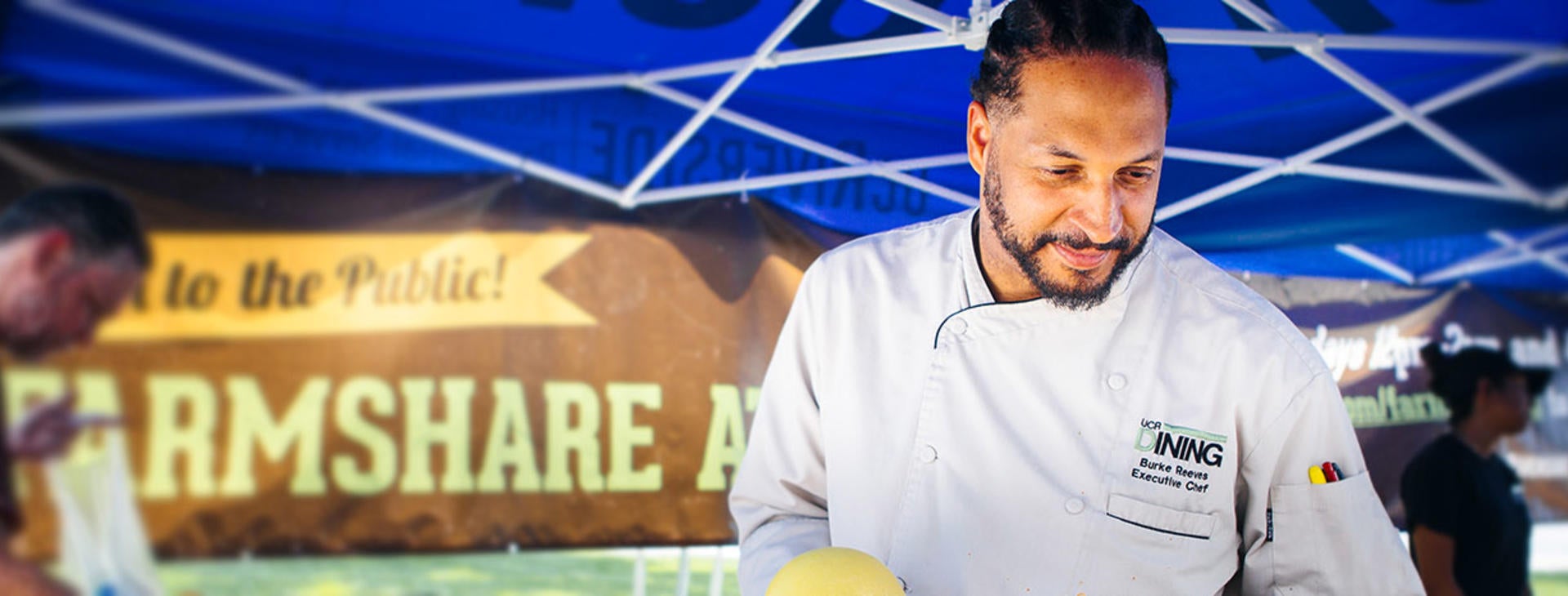 chef picking out fresh fruits and vegtables