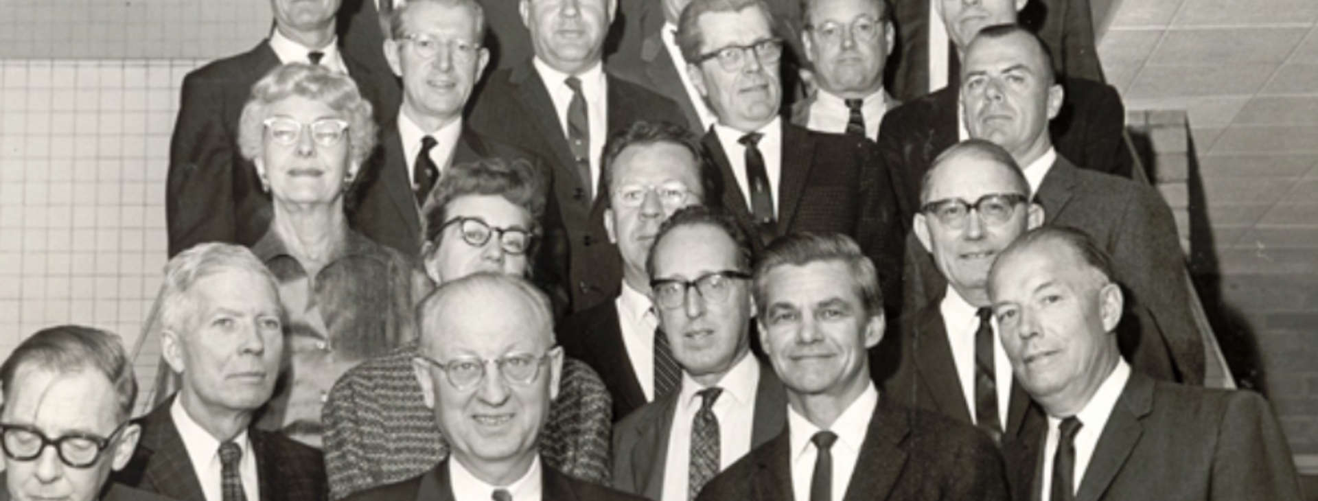 Men standing on stairs