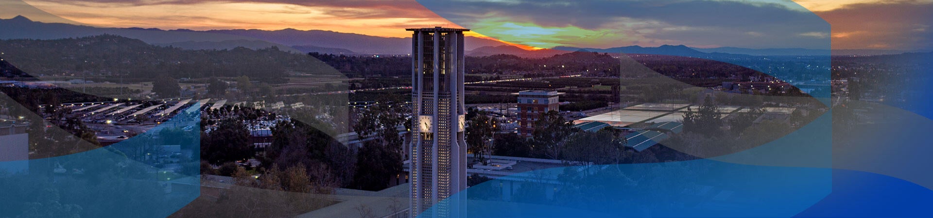 UC Riverside campus with view of bell tower at sunset