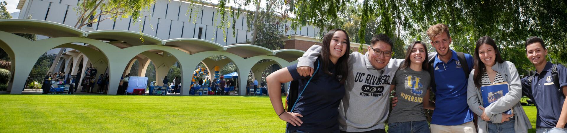 Group UCR transfer students in front of Rivera Arches on campus