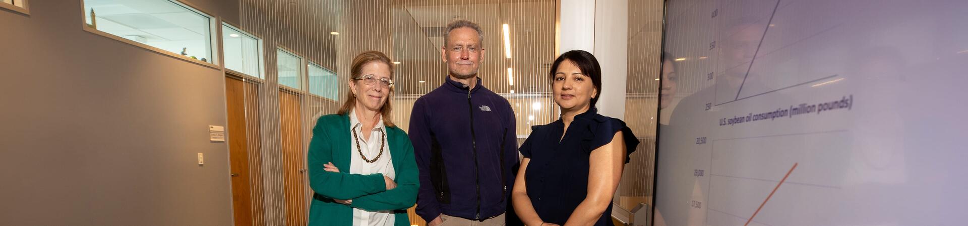 Frances Sladek, professor of cell biology, (left) James Borneman, professor of microbiology and plant pathology, (middle), and Poonamjot Deol, assistant professional researcher,
