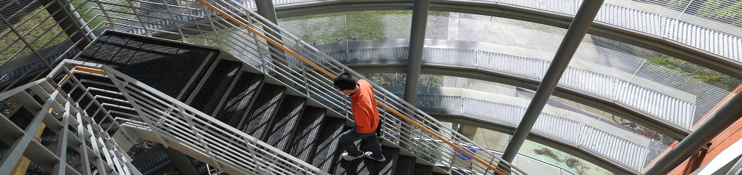 man walking up stairs